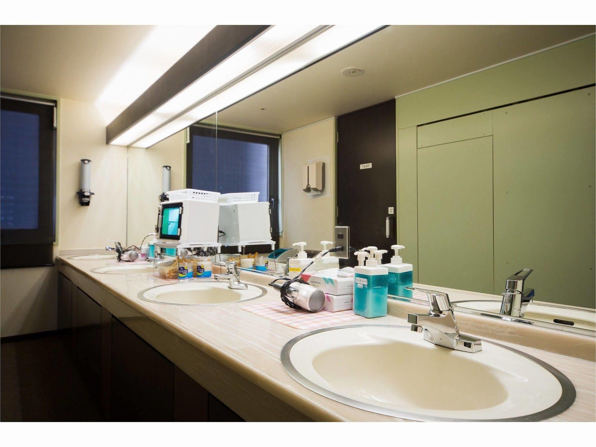 Capsule Inn Sapporo Hostel Bagian luar foto